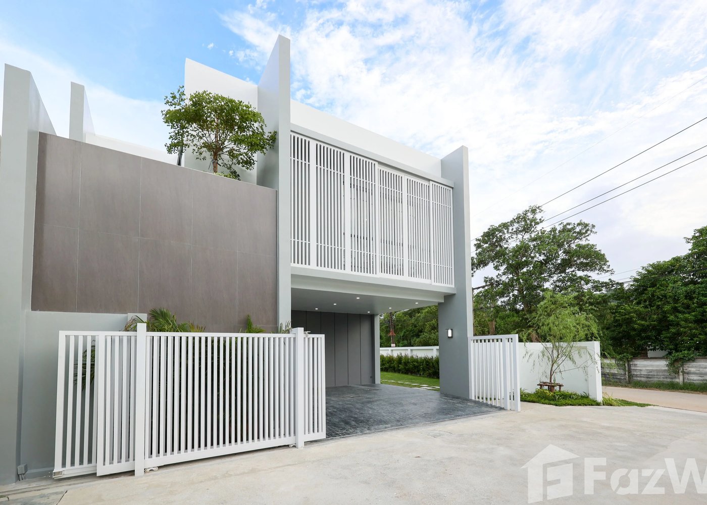 Larimar Villa — front facade and entrance gate