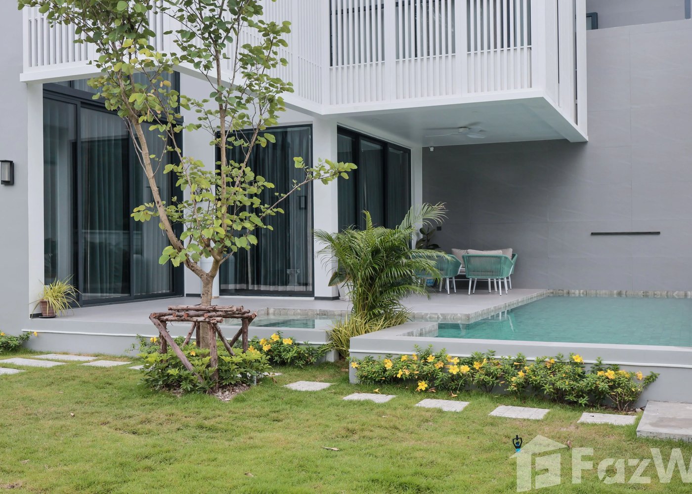 Larimar Villa — pool terrace with water feature