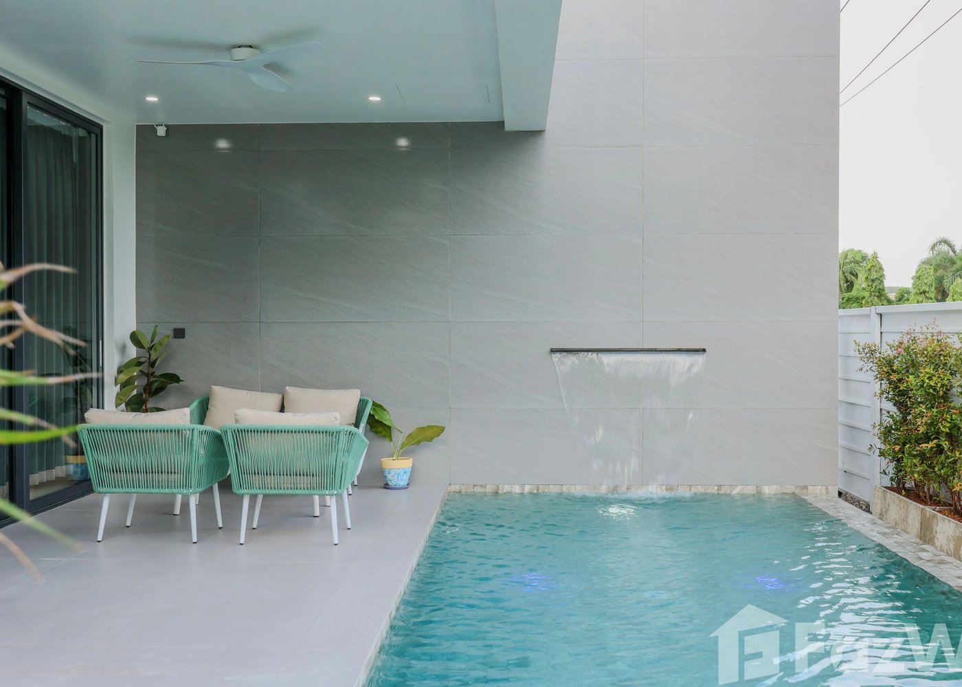 Larimar Villa — poolside seating area